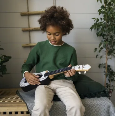 boy playing guitar