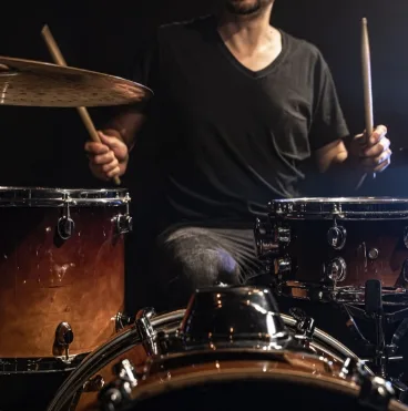 drummer plays drums