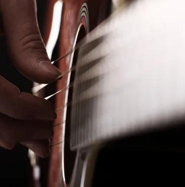 musician playing guitar